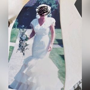 Wedding dress. Size 10 fits like 4